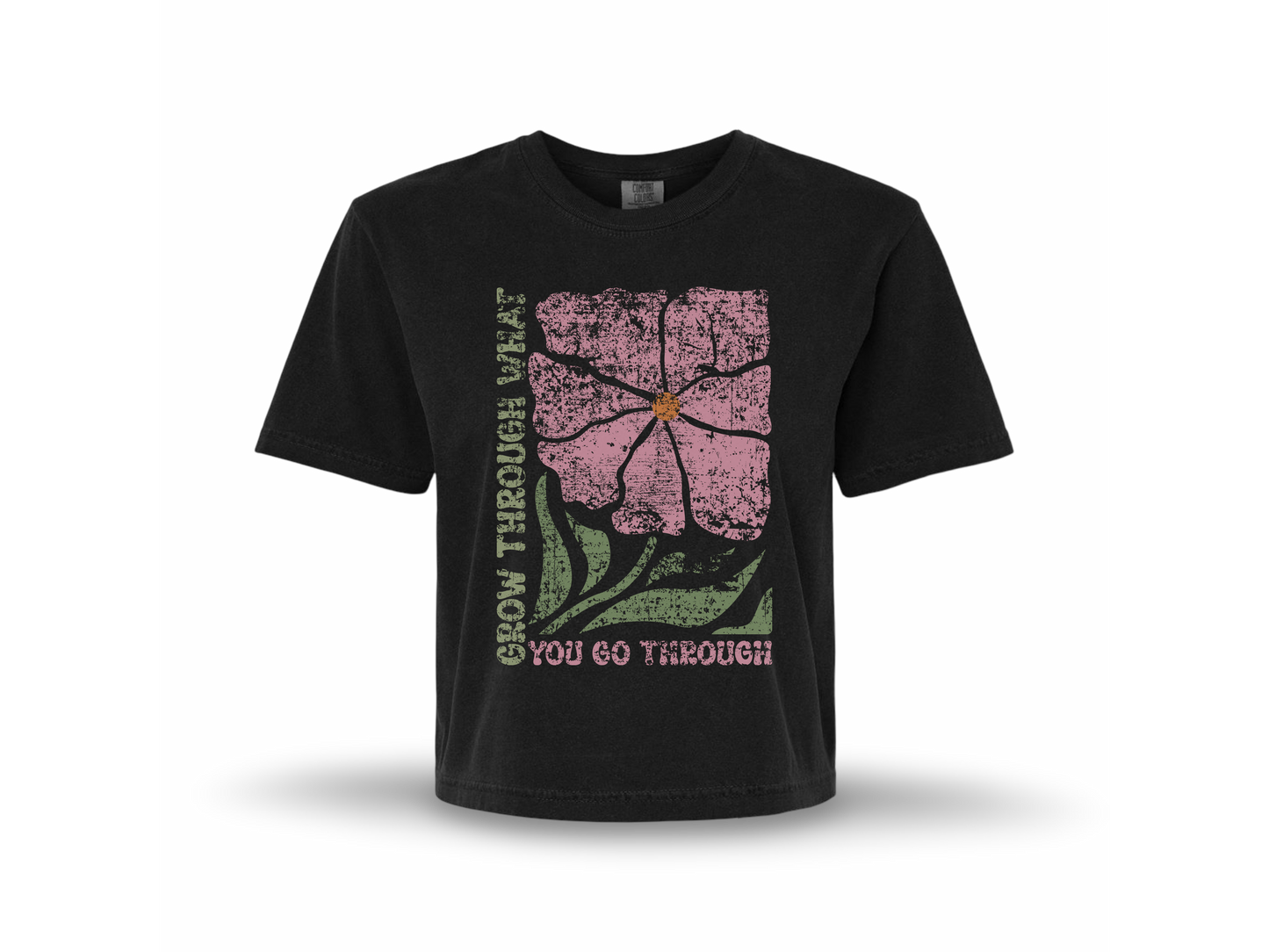 The JT Way Grow T-shirt featuring a casual design with the word "Grow" printed on the front, in white on a black fabric background.