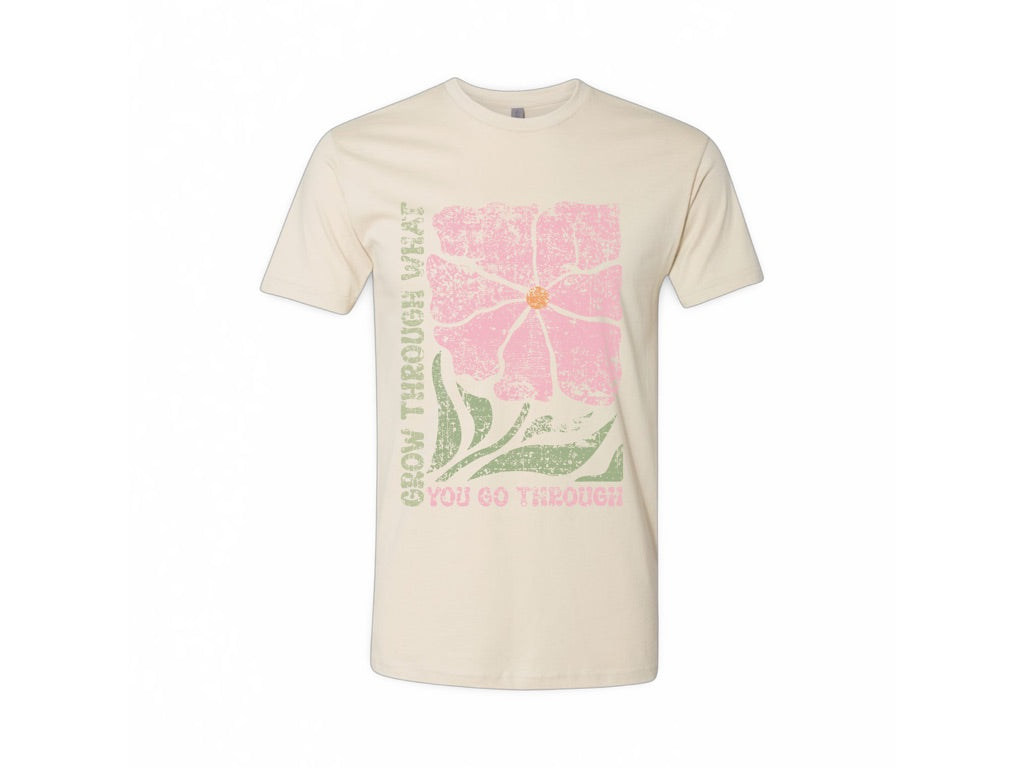 The JT way Grow T-shirt featuring a green graphic design on a comfortable cotton fabric, displayed on a model.