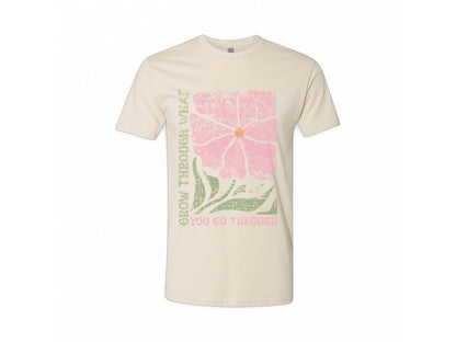 The JT way Grow T-shirt featuring a green graphic design on a comfortable cotton fabric, displayed on a model.