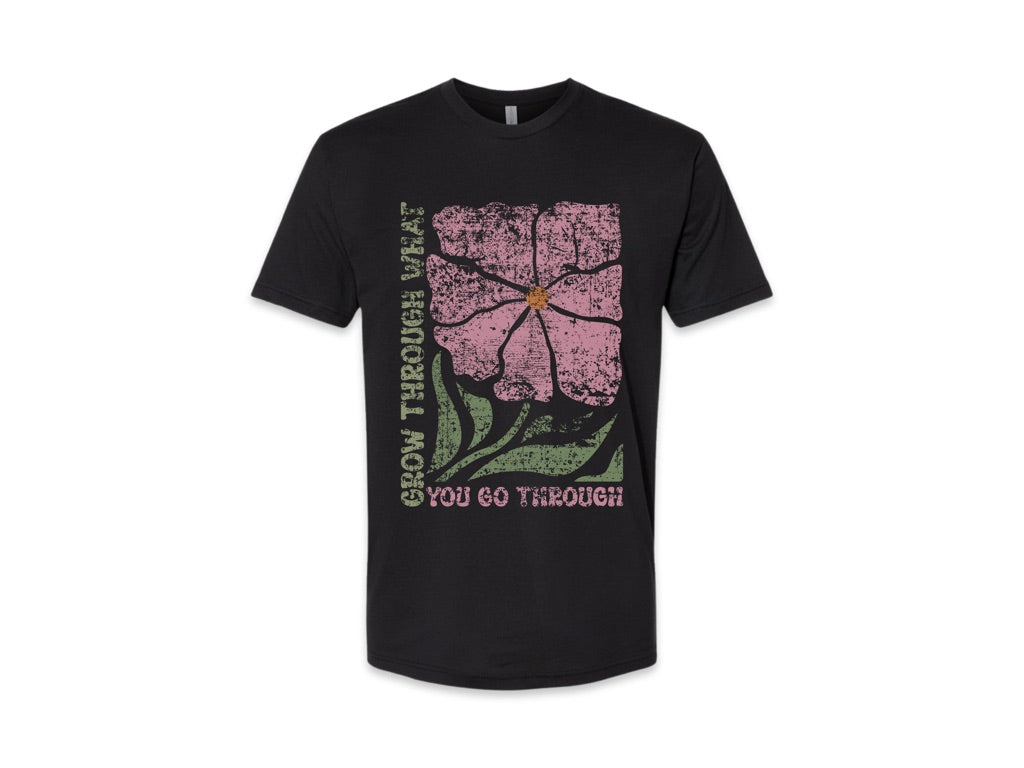 The JT way Grow T-shirt featuring a green graphic design, casual fit, and soft cotton material, displayed on a plain background.