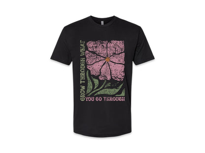 The JT way Grow T-shirt featuring a green graphic design, casual fit, and soft cotton material, displayed on a plain background.